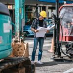 civil-engineers-work-large-road-machinery-conditions_1150-24326
