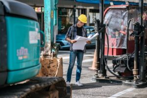 civil-engineers-work-large-road-machinery-conditions_1150-24326