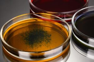 color-liquid-petri-dishes-grey-background_392895-576044
